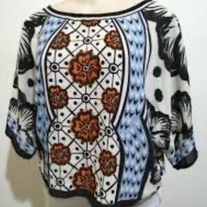 NWT- Floral-geometric print blouse by the brand Miami. Size Small